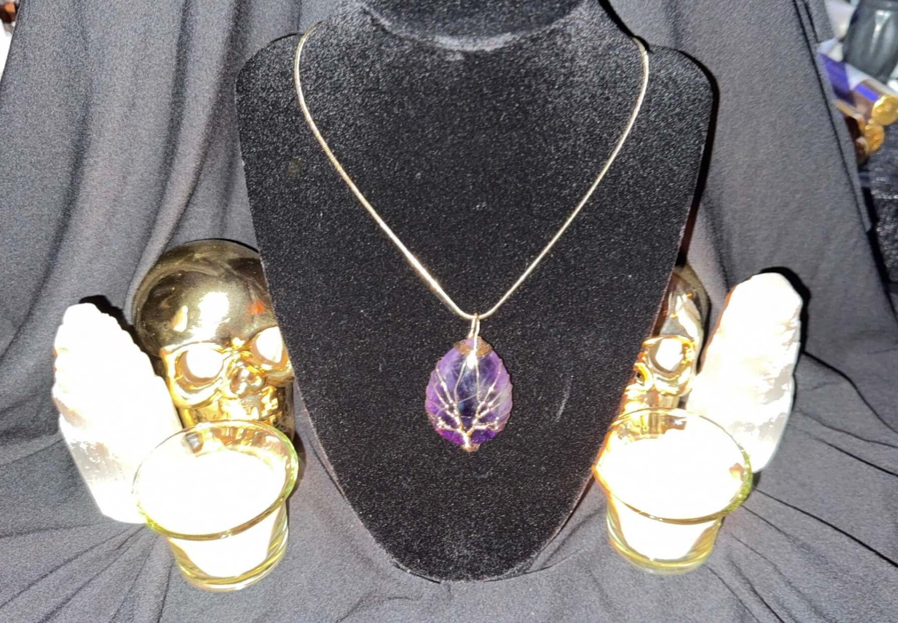 pendiente de transformación ritualizado con lucifer y choronzon